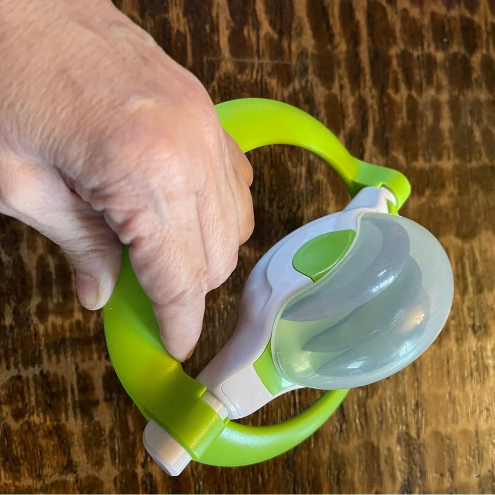 Green and White Rolling Herb Cutter